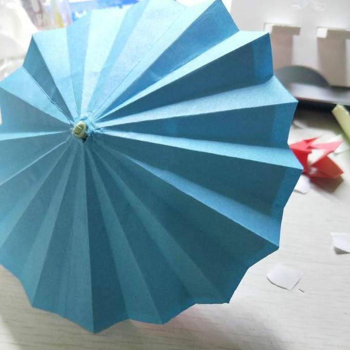 如何用纸折纸伞